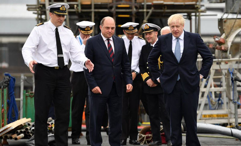 Britain’s Defence Secretary Ben Wallace and Boris Johnson 