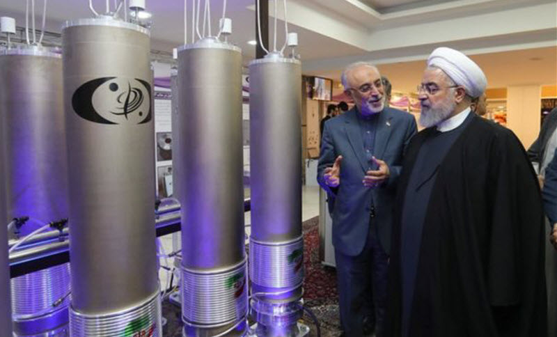 Iranian President Hassan Rouhani (3rd Left) is shown nuclear technology in Tehran, Iran