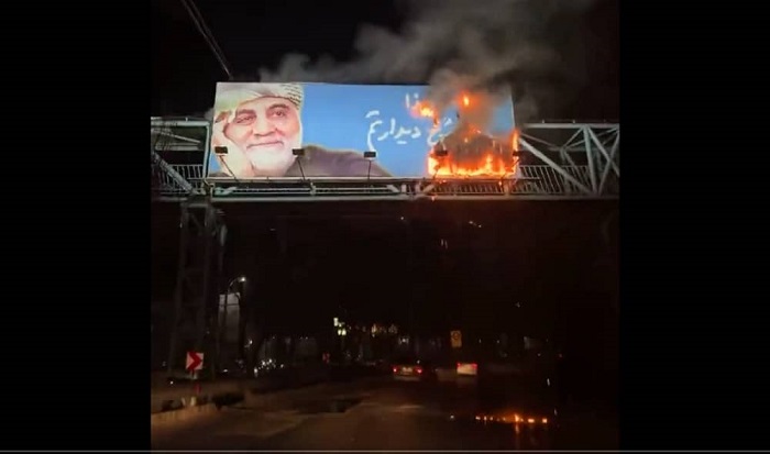 Setting ablaze Soleimani’s statue and poster;