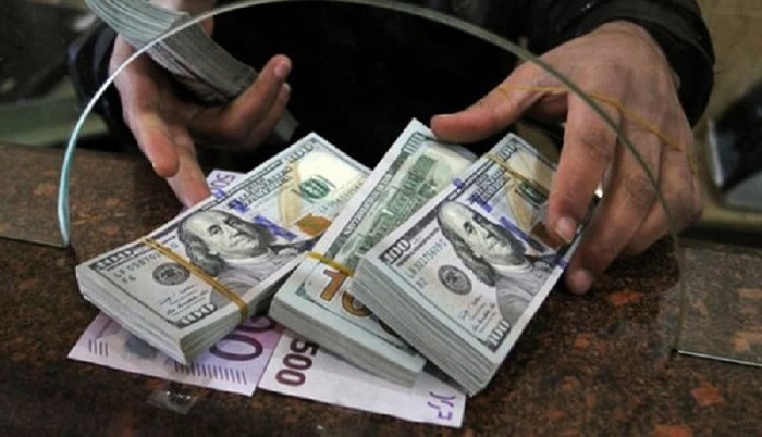 Iran's economy is on the verge of collapse, as the country's currency, the rial, continues to lose value. The dollar rate reached an all-time high of 600,000 rials on Sunday, with an 8% drop in less than a week.
