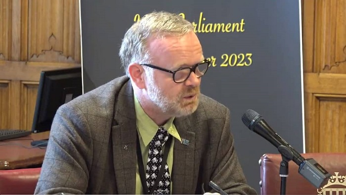 MP Martyn Day, the SNP Spokesperson for Health in the UK House of Commons, voiced his unequivocal support for the Iranian people's uprising during its first anniversary, addressing a significant audience at a conference in the UK Parliament on September 12.