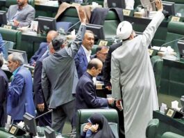 FILE PHOTO: The usual political theatrics in Iran’s parliament (Majlis)